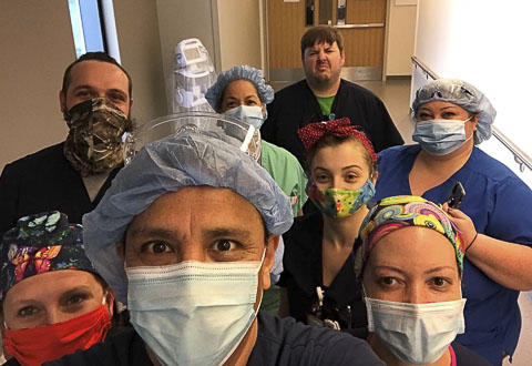 VA respiratory therapist Eduardo Cardenas and a group of fellow workers in New Orleans
