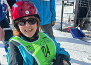 Gayle-Jayne Allyson wearing a helmet for bi-skiing.